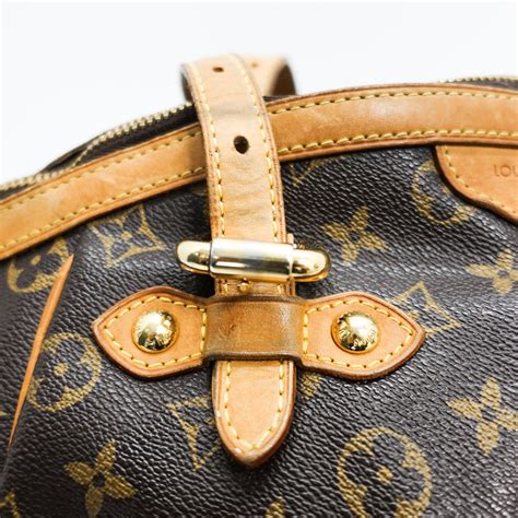 tivoli gm louis vuitton|LOUIS VUITTON Monogram Tivoli GM 1432437 .